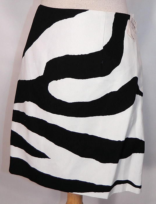Vintage Cheap & Chic Moschino Black & White Zebra Print Suit Jacket Skirt. There is a matching fabric short mini skirt, with back zipper closure and is fully lined with same designer label sewn inside. 
