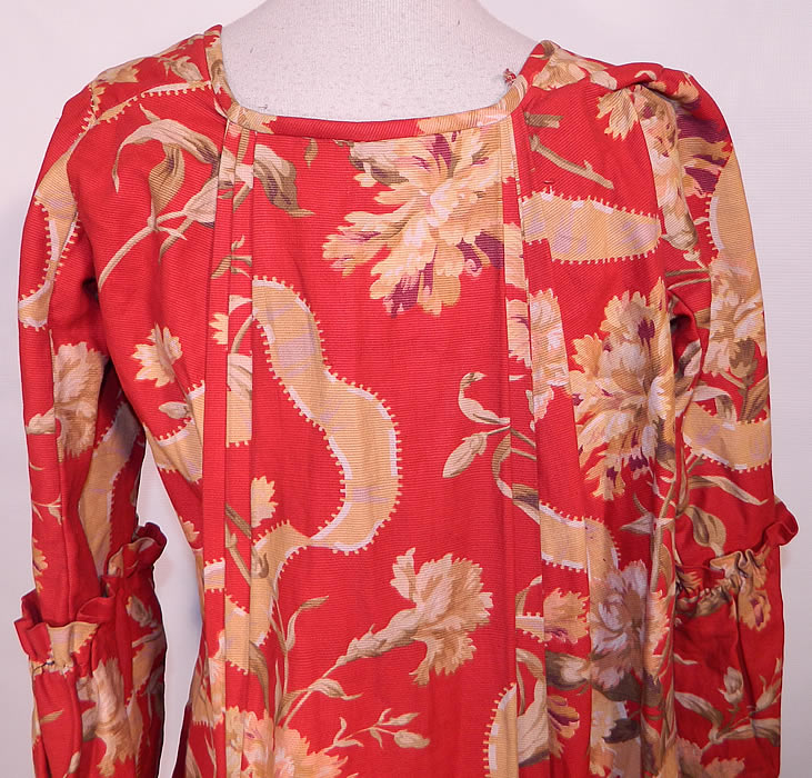 Victorian Red & Gold Carnation Flower Watteau Train Dressing Gown Robe Dress. The dress measures 48 inches long, with 34 inch hips, a 34 inch waist, 34 inch bust and 19 inch sleeves. It is in good condition, with a mended repair under the arms. This is truly a wonderful piece of wearable art inspired by 18th century fashion! 