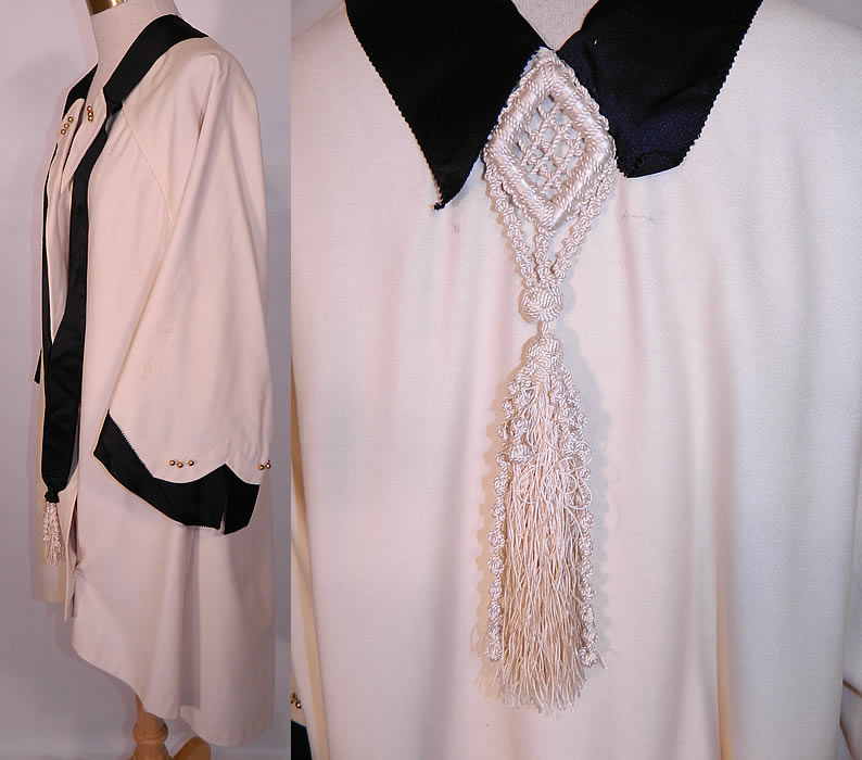 Edwardian Titanic White Wool Black Silk Tassel Trim Dolman Sleeve Coat Jacket. The coat measures 32 inches long in the front, 36 inches long in the back, with 54 inch hips, a 54 inch waist and 54 inch bust. 