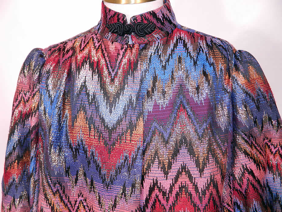 Vintage Mr. Blackwell Custom Missoni Style Striped Zigzag Lam&eacute; Suit Jacket & Skirt. This beautiful designer two piece suit has a long loose fitting boxy swing style suit jacket, with a mandarin collar, slight shoulder padding, gathered shoulders, long full balloon bishop style sleeves with fitted cuffs, a black silk toggle at the neck and snap closure on the front. 