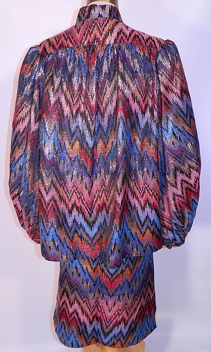 Vintage Mr. Blackwell Custom Missoni Style Striped Zigzag Lam&eacute; Suit Jacket & Skirt. The jacket measures 26 inches long, with 50 inch hips, a 50 inch waist, 44 inch bust, 14 inch back and 25 inch long sleeves. There is a matching fabric skirt, with side slit, an elastic waistband and is fully lined. The skirt measures 26 inches long, with 36 inch hips and a 26 to 30 inch waist.