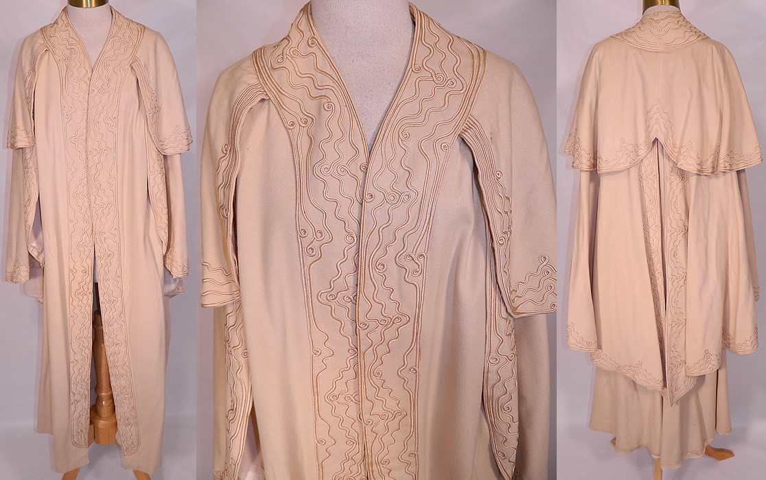 Edwardian Soutache Work Cream Wool Winter Cloak Cape Coat Jacket. This antique Edwardian era soutache work cream wool winter cloak cape coat jacket dates from 1905. It is made of a off white cream color soft wool fabric, with ecru raised soutache embroidery work done in scrolling spiral decorative designs. This wonderful winter cloak cape coat is a long floor length, with a layered tiered design, arm hole openings, an open front with no closure and the original lining is missing inside.