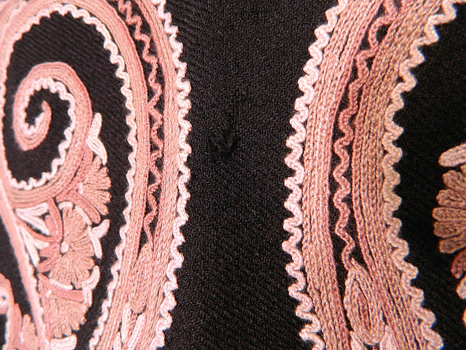 Vintage Paisley Chain Stitch Crewel Work Embroidery Black & Ecru Wool Coat. There is a "Shah Import Made in India" size XS label sewn inside. The coat measures 27 inches long, with a 40 inch waist, 36 inch bust, 16 inch back and 25 inch long sleeves. This quality made coat is in good condition, with only a small moth nip hole on the back (see close-up). It is truly a wonderful piece of wearable art! 