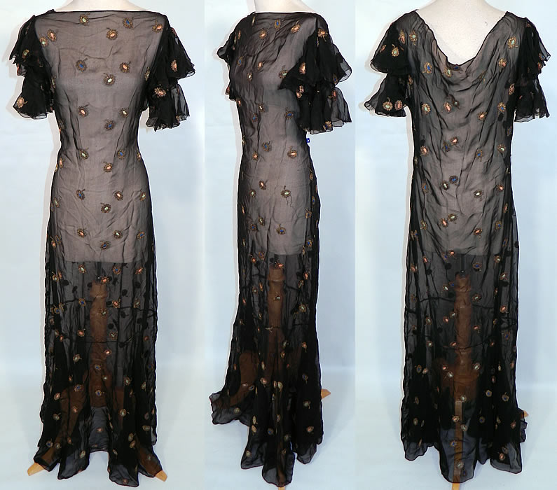 Vintage Gold Lam&eacute; Embroidered Black Silk Chiffon Bias Cut Evening Gown Dress. This vintage gold lam&eacute; embroidered black silk chiffon bias cut evening gown dress dates from the 1930s. It is made of a black sheer silk chiffon fabric, with gold metallic lam&eacute; thread woven into a floral design with colorful silk embroidered polka dot centers.