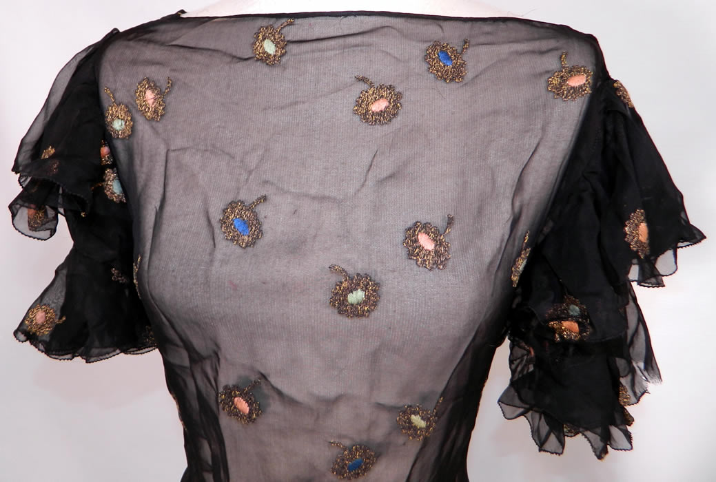 Vintage Gold Lam&eacute; Embroidered Black Silk Chiffon Bias Cut Evening Gown Dress. This beautiful bias cut long floor length evening gown, has layered ruffle short sleeves, no side opening closures and is sheer, unlined. 
