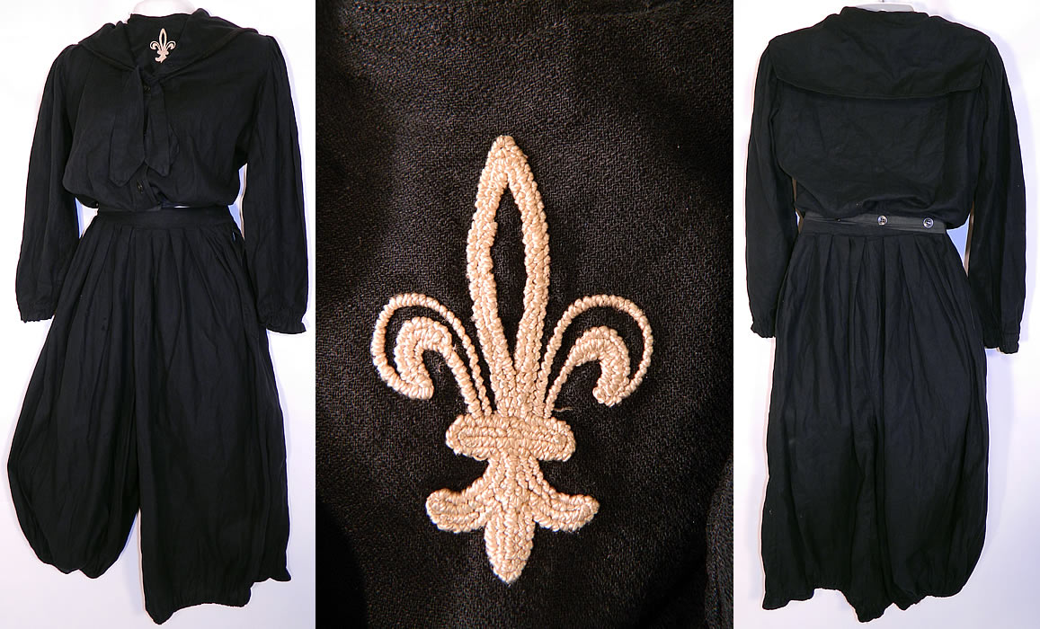 Vintage Columbia Bathing Suit Co Gymnasium Bicycle Bloomers Fleur de lis Middy Top. This Victorian era vintage Columbia Bathing Suit Co gymnasium bicycle bloomers and fleur de lis middy top dates from 1900. It is made of a black fine wool fabric, with a white french knot embroidered fleur de lis trim front top.