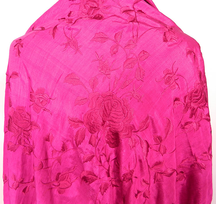 Vintage Fuchsia Purple Silk Floral Embroidered Fringe Boho Piano Shawl. There is fuchsia hand knotted macram&eacute; fine silk fringe which measures 16 inches long surrounding the entire shawl.