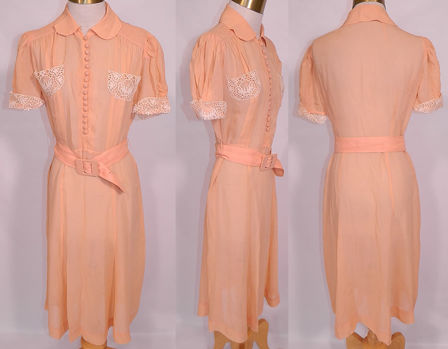 Vintage Peach Pastel Silk Chiffon White Lace Trim Belted Summer Day Dress. This vintage peach pastel silk chiffon white lace trim belted summer day dress dates from the 1930s. It is made of a sheer pastel peach silk chiffon fabric, with white lace trim front breast pockets and sleeve cuffs. This pretty peach pastel summer day dress has a Peter Pan style collar, smocking along the shoulders, short sleeves, silk button trim front, a matching fabric belt with buckle and side snap closures. 