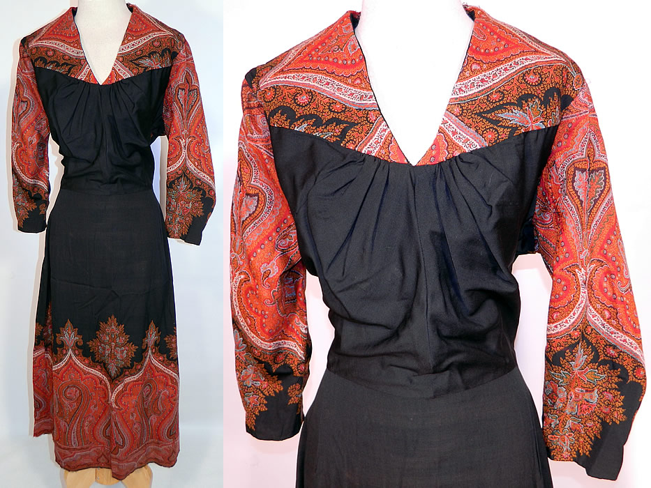 Vintage Red Orange Paisley Shawl Black Wool Dress. This vintage red orange paisley shawl black wool dress dates from the 1940s. It is made of an antique Victorian era jacquard hand loomed woven wool shawl done in strong vivid vibrant colors of red, orange, blue, black and white in a decorative paisley pattern design, with a solid black wool center.