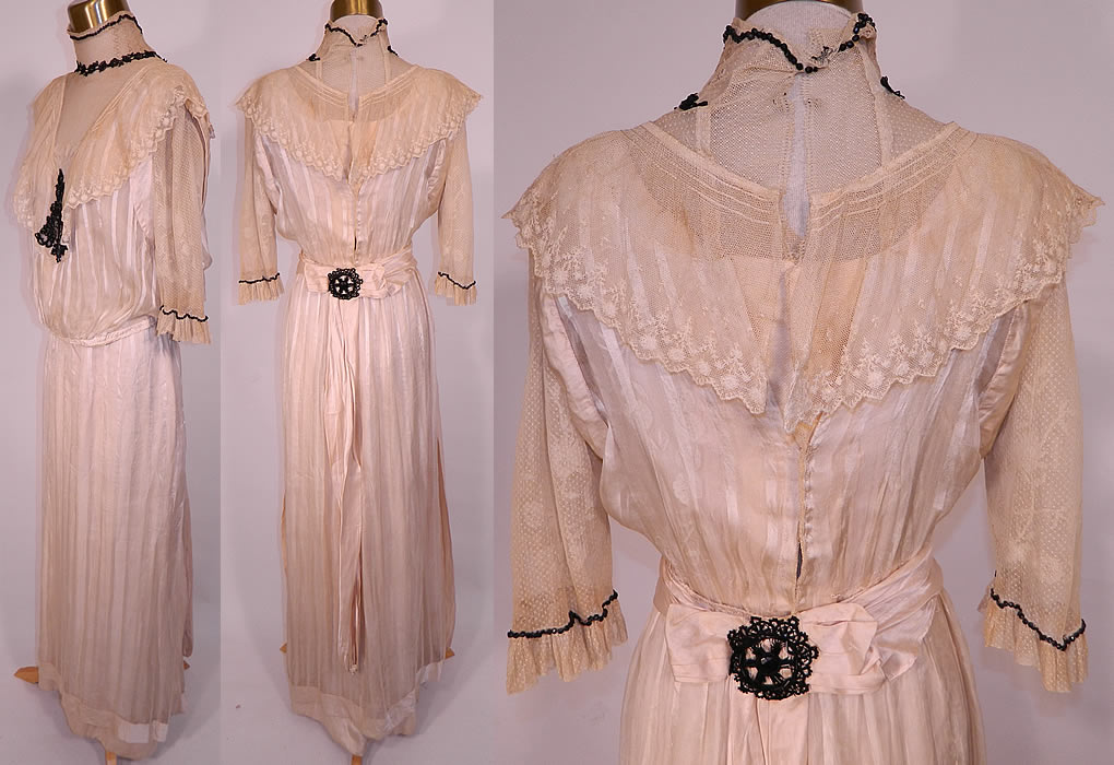 Edwardian Cream Silk Striped Net Lace Black Jet Beaded  Dress. This lovely lace dress has a pouter pigeon front bodice blouse, with a high neck collar lace yoke, 3/4 length sleeves, lined in net and has hook closures on the back. 