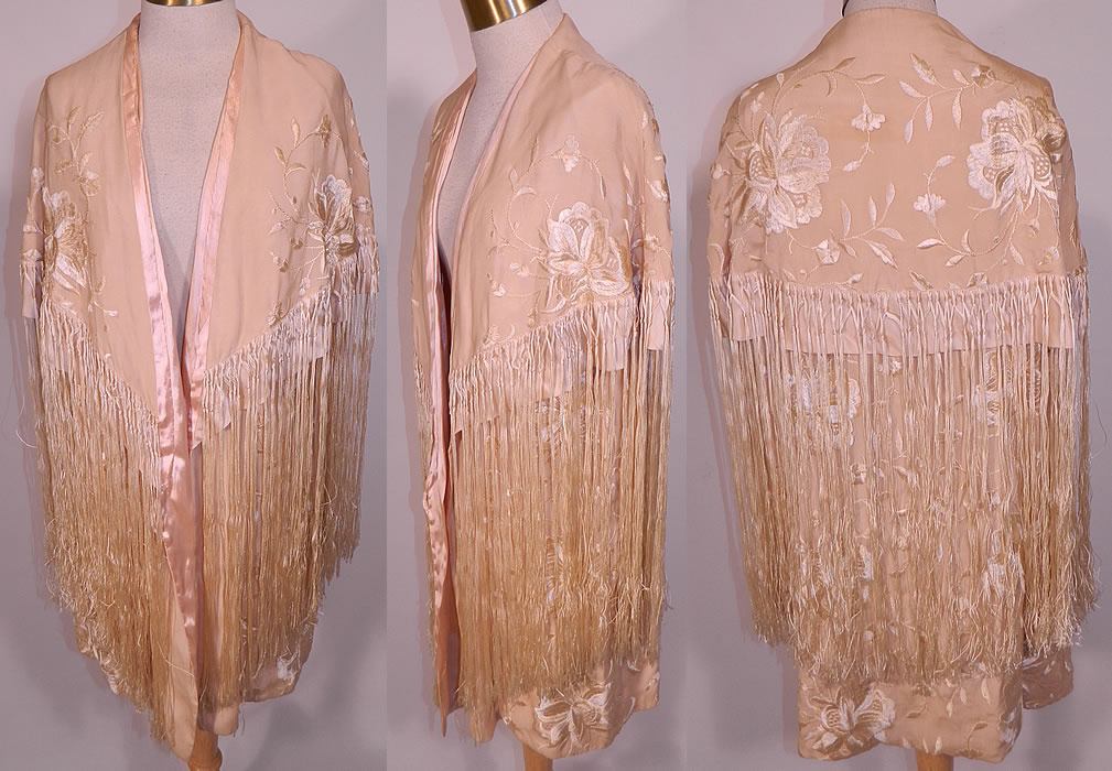 Vintage Cream Silk Floral Embroidered Fringed Piano Shawl  Coat Cloak Cape. This vintage cream silk floral embroidered fringed piano shawl coat cloak cape dates from the 1920s. It is made of an off white cream color silk fabric, with cream silk raised padded satin stitch embroidered vine leaf flowers design.