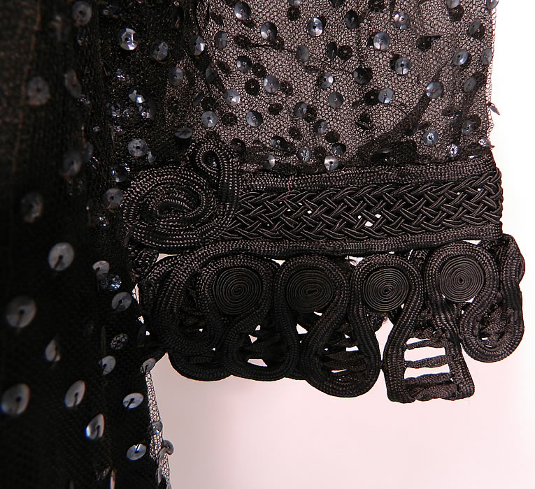 Vintage Black Silk Net Sequin Beaded Drop Waist Flapper Dress Large Size. The dress is a large size measuring 44 inches long, with 46 inch hips, a 44 inch waist, 40 inch bust, 13 inch back and 19 inch long sleeves. It is in good as-is condition, with a few small frayed holes on the net shoulders and missing some sequins in areas. This is truly a wonderful piece of wearable Art Deco textile art! 