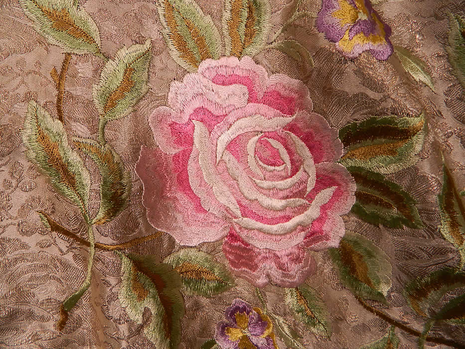 Vintage Embroidered Pink Roses Purple Pansies Silver Lame Lam&eacute; Cream Silk Shawl.  There are silk raised padded satin stitch pink roses and purple pansy flowers vine leaf designs embroidered across the center.