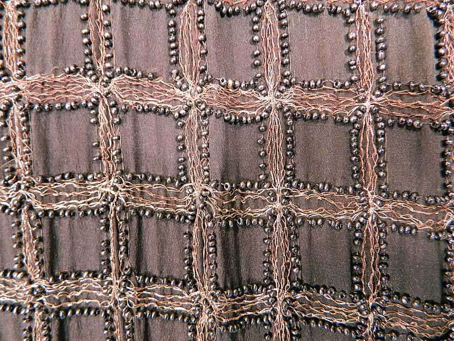Vintage Art Deco Black Silk Gold Lam&eacute; Beaded Grid Evening Flapper Coat Jacket. The coat measures 44 inches long, with 40 inch hips, a 36 inch waist, 40 inch bust, 16 inch back and 24 inch long sleeves. 