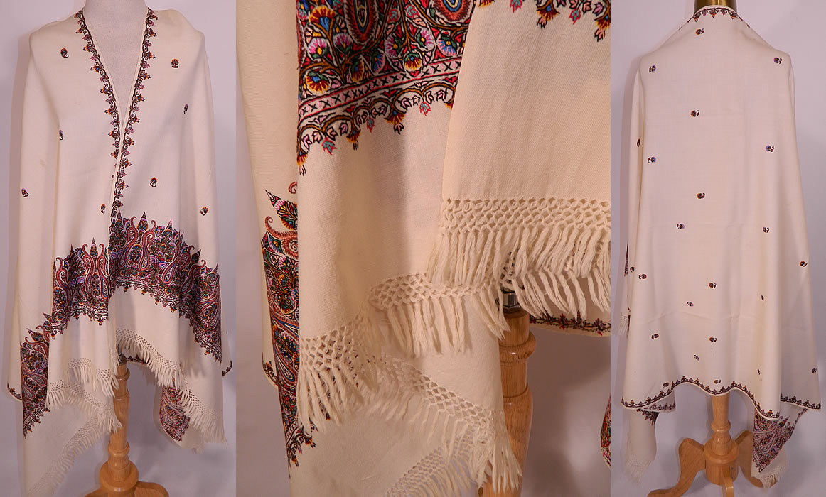 Vintage Colorful Crewelwork Embroidery Paisley Pashmina  Wool Wrap Shawl Scarf. It is made of an off white ivory cream color soft fine cashmere wool fabric with colorful hand stitched crewelwork embroidery work done in a floral and paisley tear drop motif known as the boteh.
