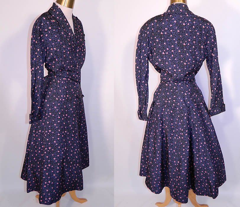 Vintage Mollie Parnis  Heart Novelty Print Silk Circle Skirt Peplum Suit Jacket Dress. This stunning two piece outfit has  a suit jacket, with a fold over lapel collar, scalloped trim edging, long sleeves with rolled cuffs, a peplum style skirted  waist and button down closure. 