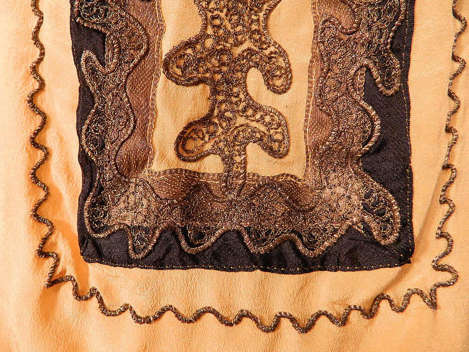 Vintage Art Deco Yellow Silk Black Applique Gold Lame Lam&eacute; Embroidered Flapper Blouse. It is made of a yellow silk crepe fabric, with black and gold lam&eacute; appliques and soutache embroidery work done in Art Deco abstract geometric designs on the front. 