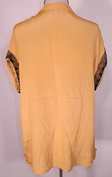 Vintage Art Deco Yellow Silk Black Applique Gold Lame Lam&eacute; Embroidered Flapper Blouse. The top measures 25 inches long, with a 38 inch waist and 38 inch bust. It is in good condition. This is truly a wonderful piece of wearable Art Deco textile art.