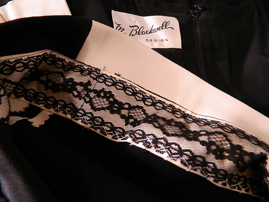 Vintage Mr. Blackwell Design Black & White Mod Color Block Silk Shift Dress.  There is a "Mr. Blackwell Design" designer label  sewn inside. It is in good condition, with only a few faint small stains on the front top. This is truly a wonderful piece of quality made unique designer wearable art.