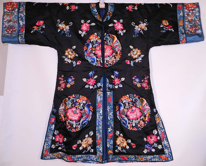 Antique Chinese Silk Embroidered Butterfly Endless Knot Peony Flower Robe Coat. There are blue silk sleeve band cuffs and trim with silk raised padded satin stitch hand embroidery work of peony flowers and bats.