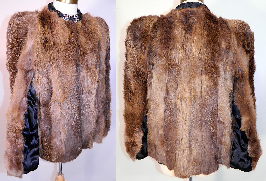 Vintage Muskrat Fur Black Satin Lined Broad Shoulder Winter Coat Jacket. This wonderful winter fur coat jacket is mid length, with a loose fitting boxy style, broad shoulder padding, long full sleeves, side pockets, hook closure on the front neck and is fully lined. 
