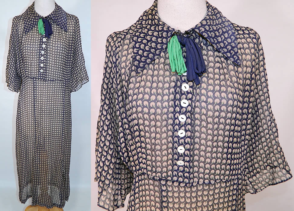 Vintage Blue & Green Silk Chiffon Novelty Print Batwing Sleeve Day Dress. This vintage blue and green silk chiffon novelty print batwing sleeve day dress dates from the 1930s. It is made of a navy blue, green and white sheer silk chiffon fabric, with a novelty print which resembles Pac-Man eating a popsicle ? design.