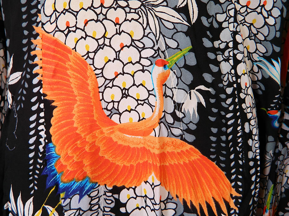 Vintage Lauhala Hawaiian Cranes Print Rayon Pake MuuMuu Dress. The dress measures 55 inches long, with 38 inch hips, a 28 inch waist, 38 inch bust, 15 inch back and 28 inch long sleeves. 