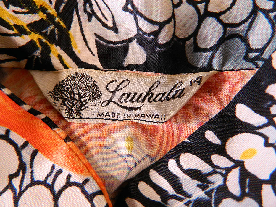Vintage Lauhala Hawaiian Cranes Print Rayon Pake MuuMuu Dress. There is a "Lauhala Made in Hawaii" label, size 14 tag sewn inside.