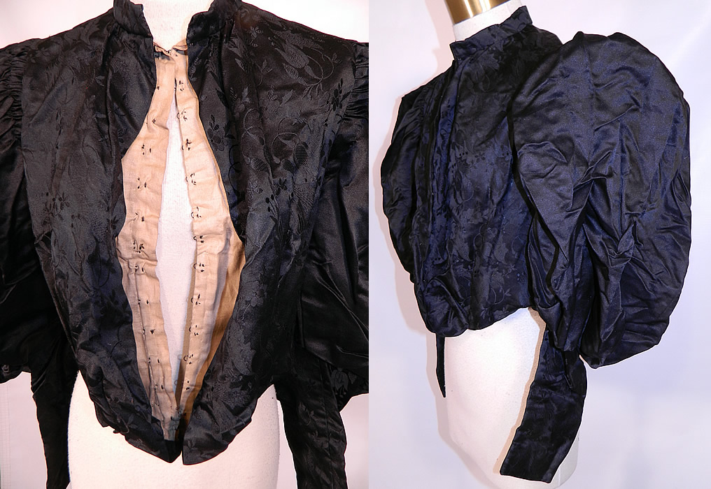 Victorian Black Silk Damask Brocade Gigot Mutton Sleeve Shirt Bodice. This beautiful bodice mourning shirt top, has a band collar, large long leg of mutton gigot style sleeves with a pouf top tapering down, a fitted waist, open front with cotton lining insert and hook closures.