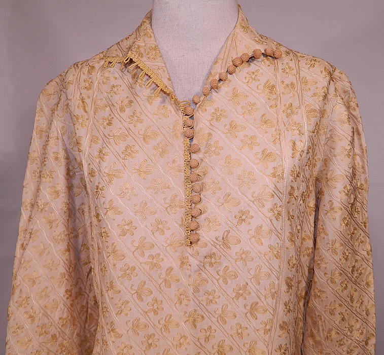 Vintage  Cream Silk Chain Stitch Embroidered Ethnic India Boho Dress. This beautiful boho dress is loose fitting, with a drop waist, pleated front skirt, long sleeves with button cuffs, crochet ball buttons down the front neck, side zipper closure and is unlined. 