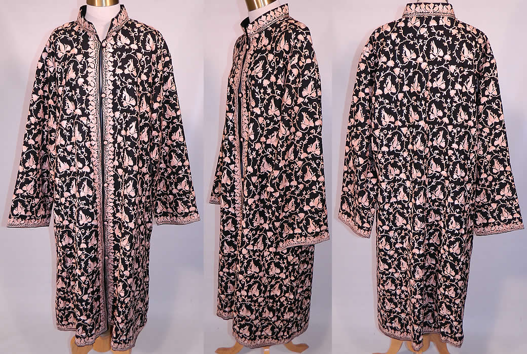 Vintage Black Wool Pink Chain Stitch Crewel Work Embroidery Ethnic Coat Jacket. This vintage black wool pink chain stitch crewel work embroidery ethnic coat jacket dates from the 1980s. It is made of a black fine soft merino wool, with pastel blush pink crewel work, chain stitch hand embroidered floral vine leaf designs.