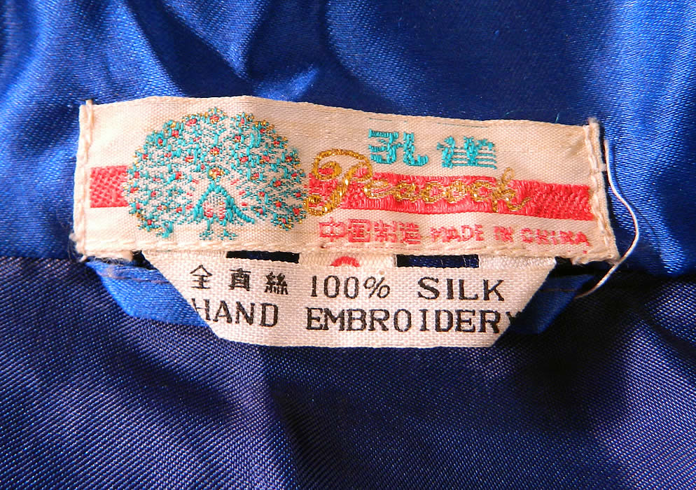 Vintage Peacock Blue Silk Hand Embroidered Chinese Dragon Pajamas Robe Pants
There is a "Peacock Made in China" label and size Small tag sewn inside. It is in good condition. This is truly a wonderful piece of wearable Chinese textile art!