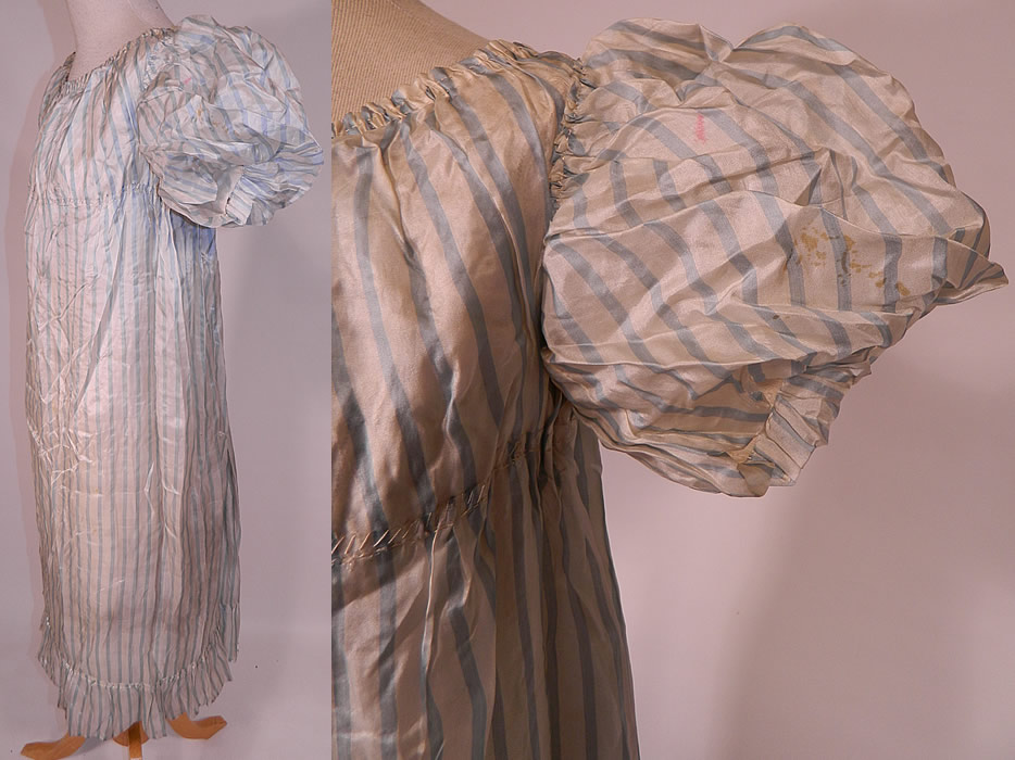 Antique Georgian Regency Era Blue & White Stripe Silk Puff Sleeve Girls Dress
It has been altered during the late 19th century with an added Victorian era white cotton batiste lace slip dress sewn inside as a lining and attached on the top, with hook closures down the back. 