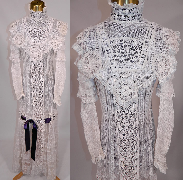 Edwardian Belle Epoque White Mixed Lace Purple Ribbon Skirt Wedding Gown Dress
This exquisite Edwardian era Belle Epoque antique white mixed lace wedding gown dress dates from 1905. It is made of a white net, mixed lace fabric, with appliques and a purple ribbon woven around the skirt tied in a bow on front. 