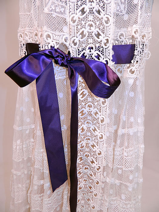 Edwardian Belle Epoque White Mixed Lace Purple Ribbon Skirt Wedding Gown Dress
It is in good condition, clean condition with only a some tiny holes in the net and a few faint small age spot stains which are hardly noticeable. This is truly an exceptional piece of antique textile lace art which could be worn as a wedding gown! 