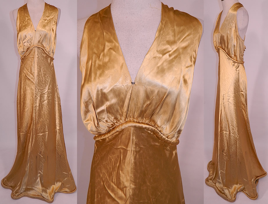 Vintage Hollywood Glam Gold Silk Satin Sexy Bias Cut Dress Evening Gown
This vintage Hollywood glam gold silk satin sexy bias cut dress evening gown dates from the 1930s. It is made of a luxurious silk satin gold color textured fabric.