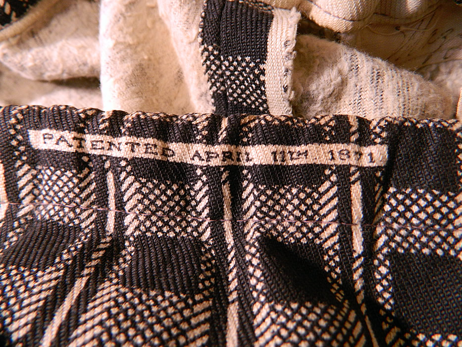 Victorian Black & White Flannel Cotton Calico Floral Plaid Print Petticoat Skirt
This wonderful winter petticoat skirt has a drawstring waist, back closure, stamped "Patented April 11th 1871" around the waistband and has a soft flannel backed lined fabric. The petticoat measures 37 inches long, with an adjustable up to 34 inch waist. 