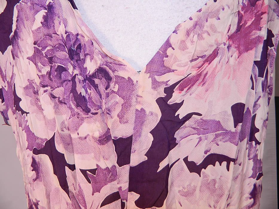 Vintage Purple Peony Print Floral Silk Bias Cut Slip Dress
This beautiful bias cut slip dress is a long floor length, sleeveless, with plunging V necklines, an added purple silk waistband and side zipper closure. 