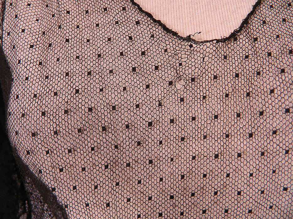 Vintage Black Swiss Polka Dot Net Sheer Bias Cut Dress Gown
The dress measures 63 inches long, with 40 inch hips, a 30 inch waist and 40 inch bust. It is in good condition, with only a tiny frayed hole on the front neckline (see close-up). This is truly a wonderful piece of wearable textile art!