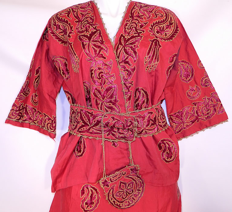 Ottoman Turkish Tugra Red Silk Gold Embroidered Jacket Harem Pant Belted Purse Outfit

It is made of a dark red cotton fabric, with red silk and gold metallic threads done in tambour chain stitch embroidery work.
