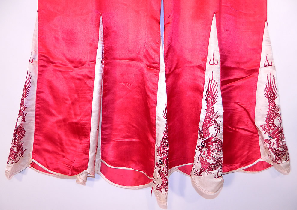 Vintage Red & White Silk Embroidered Asian Chinese Dragon Pajamas. 
The top measures 24 inches long, with a 44 inch waist and 40 inch bust. There are matching loose fitting pants, with flared, pleated, scalloped bottom cuffs and a V front top elastic back waistband.