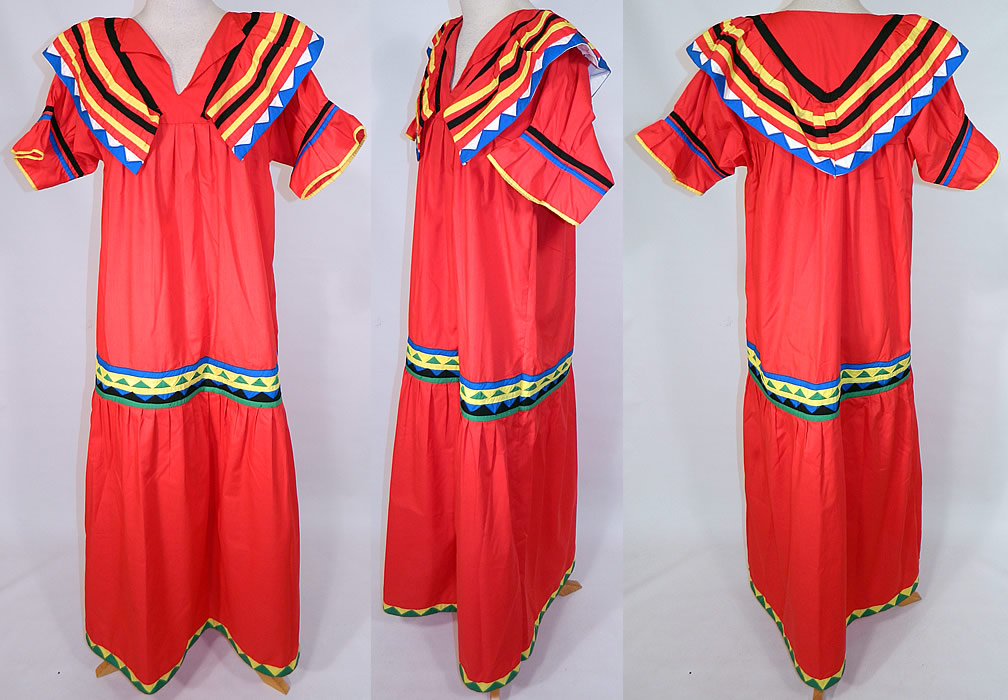 Vintage Seminole Native American Indian Sawtooth Patchwork Colorful Boho Maxi Dress
This vintage Seminole Native American Indian sawtooth patchwork colorful boho maxi dress dates from the 1970s. It is made of red cotton fabric, with vibrant colorful patchwork sawtooth, striped designs.