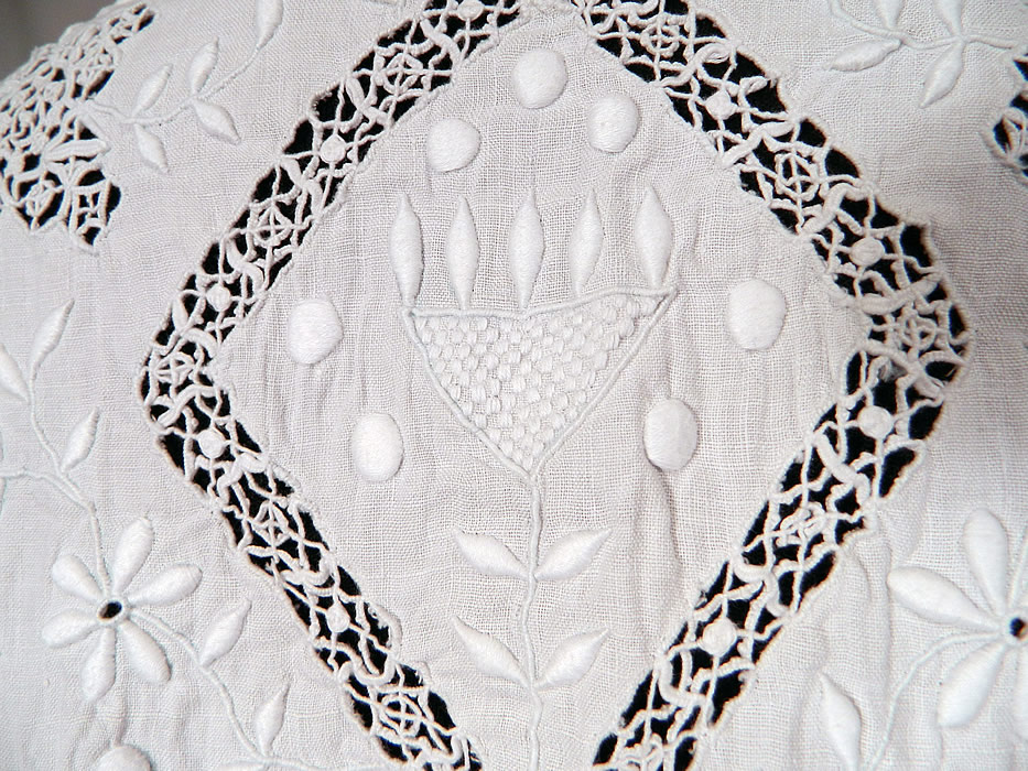 Edwardian White Linen Eyelet Embroidered Drawn Cut Work Lace Blouse Vest Top
The top measures 19 inches long in the front, 13 inches long in the back, with a 40 inch waist and 40 inch bust. 