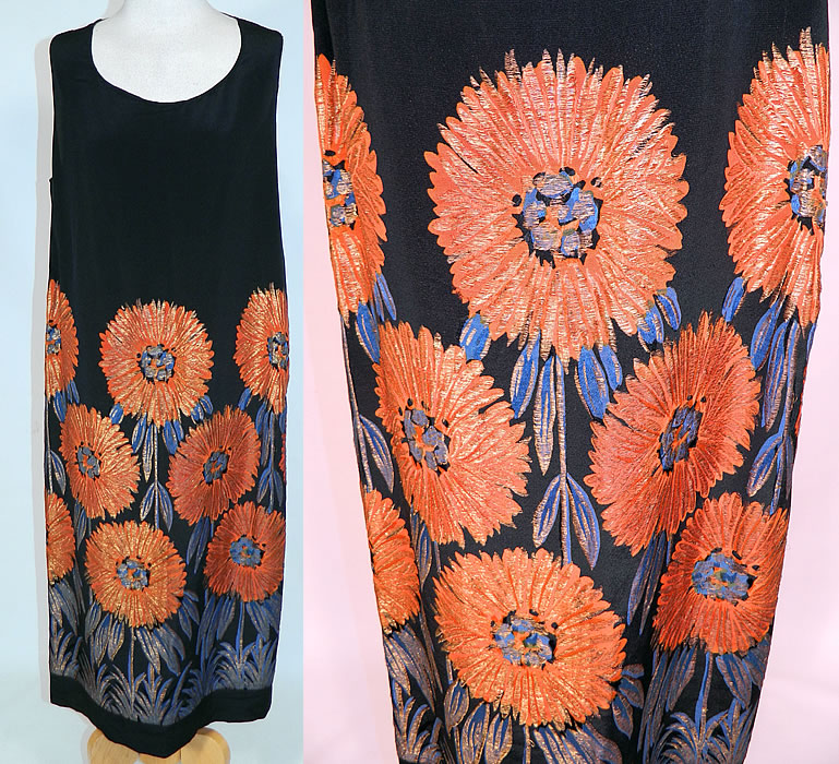 Vintage Art Deco Black Silk Gold Lam&eacute; Lame Orange Sunflower Flapper Dress
This vintage amazing Art Deco black silk gold lam&eacute; orange sunflower flapper dress dates from the 1920s. It is made of a black silk crepe de chine fabric, with gold metallic lam&eacute; threads woven through it creating a highlighted bright orange and blue sunflower design.