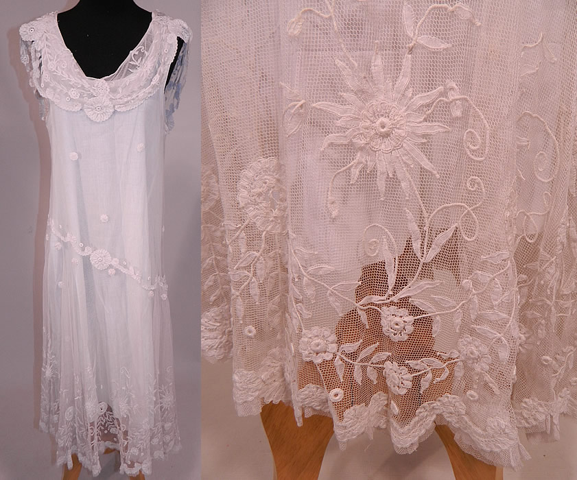 Vintage White Net Princess Tape Lace Applique Embroidered Drop Waist Dress & Slip
This exceptional vintage white net princess tape lace appliqu&eacute; embroidered drop waist dress and slip dates from the 1920s. It is made of a white sheer cotton net princess lace fabric, with tape lace appliqu&eacute; embroidery work done in a floral vine leaf, spiral, scroll work, polka dot designs.