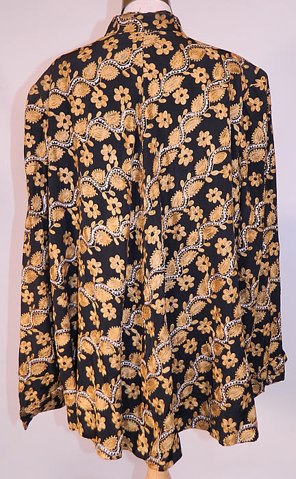 Vintage Black Silk Rayon Chain Stitch Crewel Work Embroidery Swing Coat Jacket.
The coat measures 30 inches long, with 48 inch hips, a 48 inch waist, 48 inch bust, 16 inch back and 25 inch long sleeves. 