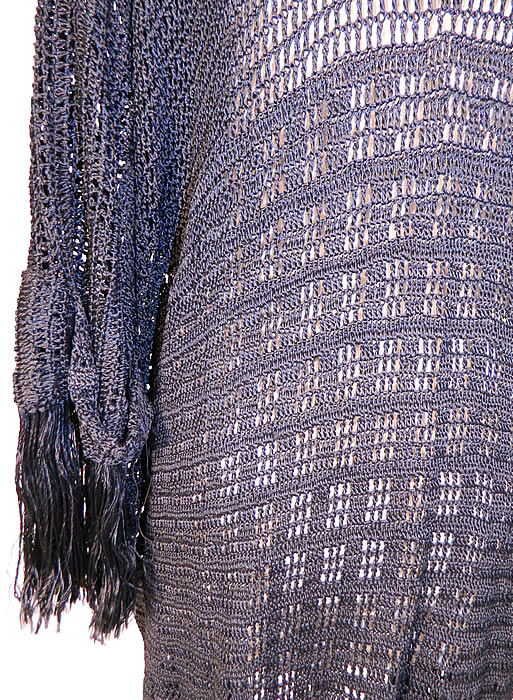 Vintage Black Silk Knit Crochet Lace Fringe Shawl Long Coat Boho Sweater Jacket
The coat measures 45 inches long, with 40 inch hips, a 40 inch waist, 38 inch bust, 18 inch back, 17 inch long sleeves and 10 inch long fringe trim. It is in good condition. This is truly an amazing, quality made piece of wearable bohemian art! 