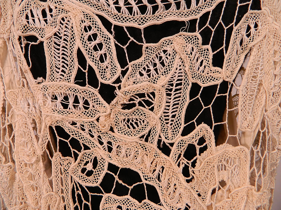 Vintage Cream Battenburg Needle Lace Wedding Gown Dress & Silk Slip
The slip measures 53 inches long, with 46 inch hips, a 38 waist and 38 inch bust. The dress is in good condition, with only a few small mended repairs, breaks in the connecting brides and bars (see close-ups). This is truly an amazingly beautiful piece of wearable lace art! 