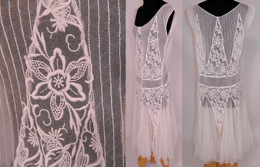 Vintage White Embroidered Pleated Tulle Net Lace Chemise Drop Waist Dress
This lovely lace chemise shift style drop waist dress is loose fitting, sleeveless, with rounded scoop necklines, flared tulle net skirt panels and is sheer because it is unlined. The dress measures 44 inches long, with 34 inch hips, a 32 inch waist and 34 inch bust. It is in good condition. This is truly a beautiful piece of wearable lace art! 