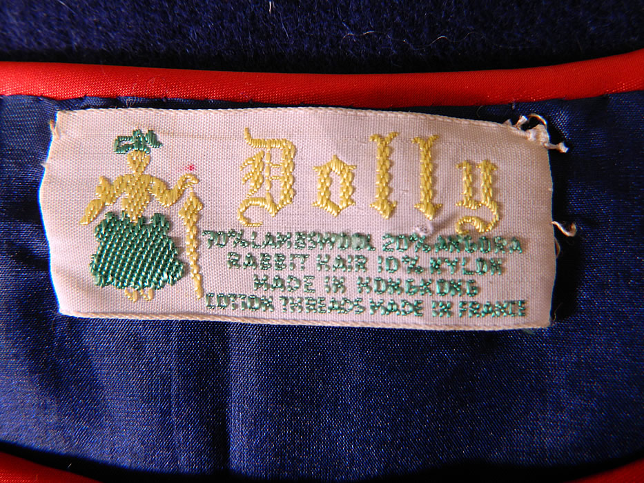 Vintage Dolly Hong Kong Label Blue & Red Embroidered Beaded Ladybug Sweater
There is a "Dolly Made in Hong Kong " label sewn inside. The sweater measures 20 inches long, with a 40 inch waist, 40 inch bust, 16 inch back and 17 inch long sleeves. It is in good condition. This is truly a wonderful piece of novelty whimsical wearable art! 